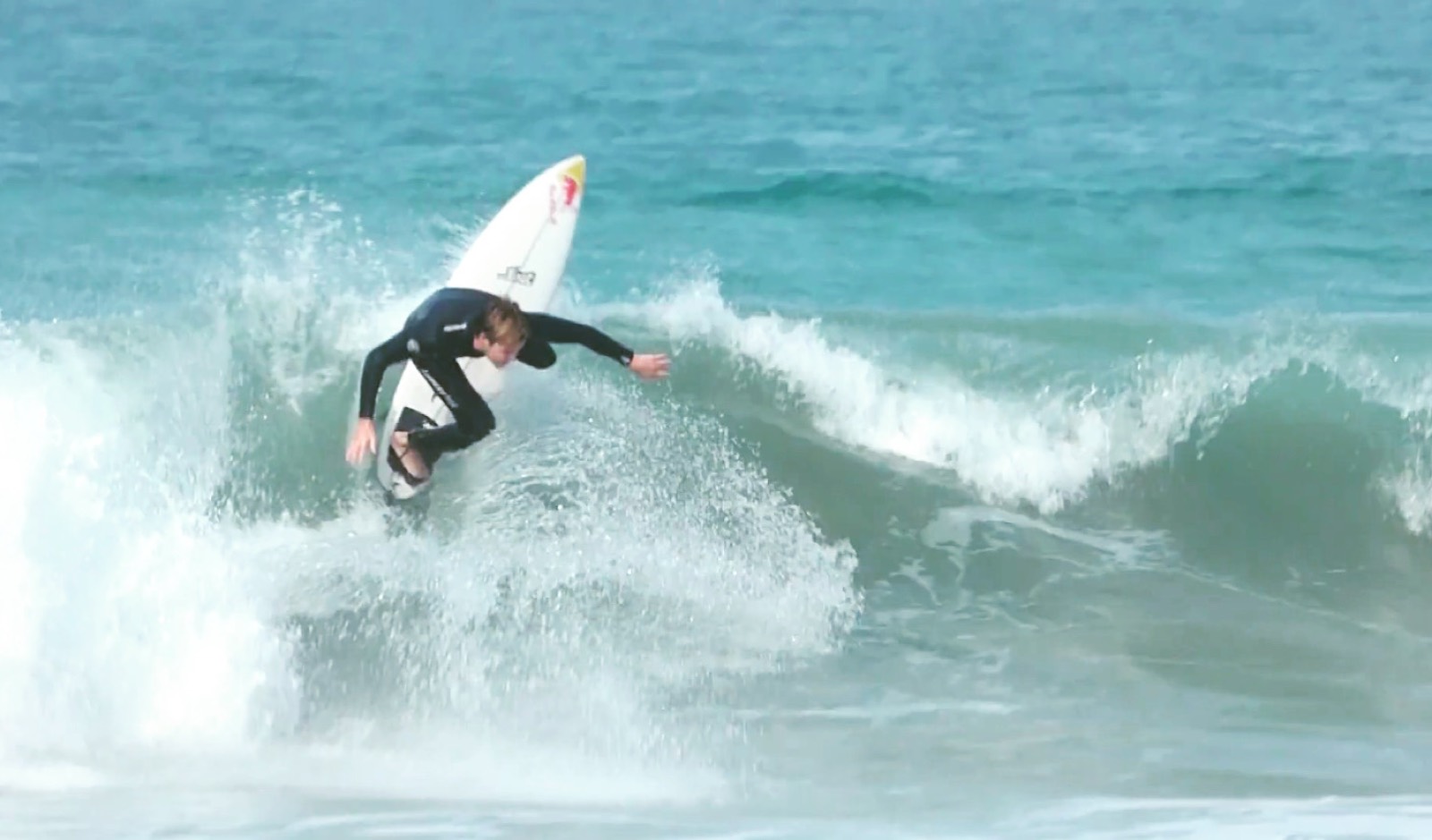 Caden Marquis, author of SurfParkGuide, surfing in the ocean
